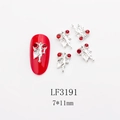 Detailed macro view of LF3191 nail art charms with red rhinestones and silver leaves - Silver Red Rhinestone Leaf Style (3191) / 10 Pieces Pack