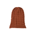 Macro detail of caramel knit beanie showing textured checkered pattern and soft fabric - Rust red