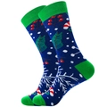 Detail of Christmas crew socks with Santa reindeer patterns and reinforced green toe - Christmas Candy