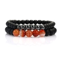 Detailed macro view of double-layered beaded bracelet with matte black and tiger eye stones - Matte Black Beads + Red Agate Beads / Two-Piece Set