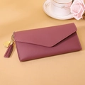 Deep purple long envelope wallet with gold heart tassel on a beige lifestyle background - Long Style / Deep Pink