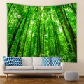Detail of vibrant green forest tapestry hanging on a modern living room wall - 73X95CM (Brushed Fabric) / Lush Green Forest Sunlight (GT100012)