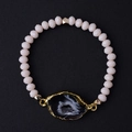 Pink faceted crystal beaded bracelet with a gold-edged black druzy agate slice - Black Druzy/Pink Beads