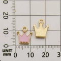 Pink and gold crown alloy pendants for jewelry making shown on a metric size grid - Pink Crown Pendant (10994)