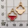 Golden cloud-shaped alloy pendant charms with red enamel detail on a metric scale mat - Red Four-Leaf Clover Pendant (11012)