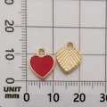 DIY jewelry charms featuring red heart and gold leaf enamel pendants on a metric scale - Red Heart Pendant (11027)