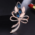 Spilla a fiocco in oro rosa con pietre blu, occhi di gatto rosa e micro-diamanti incastonati - Fiocco di cristallo - Blu scuro