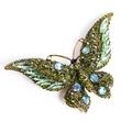 Vintage gold butterfly brooch with emerald green crystals and iridescent rhinestones - Green