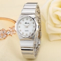 Detail of silver ladies watch with diamond markers and Roman numerals on white dial - Silver