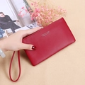 Red long wallet for women with zipper closure and Forever Young text and wrist strap - Red