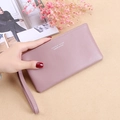 Long purple women's wallet with wrist strap and textured synthetic leather finish - Light Purple