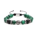 Dettaglio di perle di malachite verde e testa di Buddha in argento su bracciale intrecciato - Acciaio Malachite