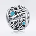 S925 sterling silver December birthstone charm with blue stones and floral patterns - December