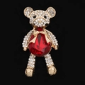 Golden bear charm with pavé crystals and a large red teardrop-shaped gemstone - Red