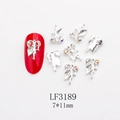 Silver alloy leaf and tassel nail charm with rhinestones shown on red manicure - Silver AB Rhinestone Leaf Style (3189) / 10 Pieces Pack