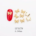 Detailed view of golden butterfly nail charms with pearls and 6.5x8mm size info - Full Rhinestone Pearl Butterfly Style (3179) / 10 Pieces Pack