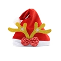 Red Christmas hat with golden reindeer antlers, white snowflakes and a polka dot bow - A Large Hat With Deer Antlers And A Bow.