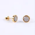 Minimalist gold stud earrings featuring round grey cabochon stones and clear crystals - Flash Stone (Labradorite)