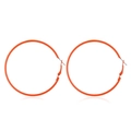 Neon orange hoop earrings in classic 80s retro style with polished finish on white backdrop - Orange