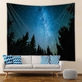 Detail of galaxy forest tapestry hung on wall above a cozy white sofa and blue pillows - 73X95CM (Cross-border Brushed) / Starry Galaxy Forest (GT100020)