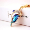 Blue crystal dolphin keychain with gold metal plating and sparkling white rhinestones - Blue