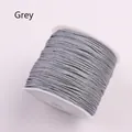 Grey spool of braided nylon cord on white reel for DIY jewelry and handicraft - Dark Gray