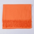 Bright orange cashmere-like scarf for women featuring fine knit texture and long tassels - Orange