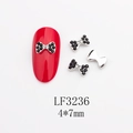 Détail de bijoux d'ongles nœuds avec strass noirs et blancs, taille 4x7mm - Base Argentée Strass Noir Blanc (LF3236)