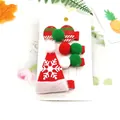 Christmas 4-piece hair clip set with red sequin Santa hat and colorful pom-poms - 4-Piece Large Snowflake Hat Set