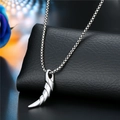 Close-up of antique silver horn pendant on a punk style stainless steel chain - Spiral Horn