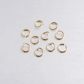 Detailed close-up of premium gold-plated stainless steel 10mm jump rings for DIY jewelry - 1.2*10mm / Gold