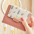 Pink and beige PU leather wallet for women with leaf pattern and secure metal buckle - Pink