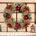 Christmas wreath with pine needles, pinecones, red ornaments, and a rustic burlap bow - Burlap Style / 38cm