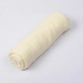 Solid pale yellow crinkle cotton linen long scarf rolled in a cylindrical shape - Milk White