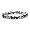 Elastic beaded bracelet featuring faceted black and metallic silver glass beads - Black & Silver with Gold Bead