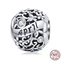 S925 sterling silver hollow floral charm with April engraving and sparkling zircons - April