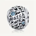 March birthstone charm in 925 sterling silver with blue gemstone and hollow vine pattern - March