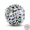 S925 sterling silver August birthstone charm with green zircon and hollow leaf patterns - August