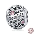 Sterling silver October birthstone charm with pink zircon and intricate scrollwork - October