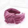 Close-up of knotted velvet headband in deep purple showing premium soft texture - Fuschia
