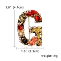 Dettaglio della spilla a forma di G con misure 4,7 cm x 3,3 cm e peso di 19 g - Stile Lettera G (BC18Y0824-G) / Oro