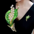 Elegant lily of the valley brooch with green enamel leaves and white pearls in gold - Lily Leaf Green