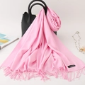 Pink cashmere feel scarf with fringe tassels draped over a black handbag - 200*70cm / Pink