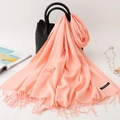 Salmon pink cashmere-feel scarf with elegant tassels draped over a leather handbag - 200*70cm / Snow Bud