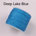 Spool of Deep Lake Blue jewelry cord made of durable braided nylon for DIY crafting - Teal