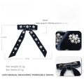 Navy velvet bow hair clip with crystal floral accents and pearls on white background - Dark Blue