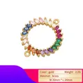 Macro shot of 24mm gold brass pendant with multi-color cubic zirconia rainbow stones - VS421B/Circular