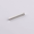 Macro detail of silver rectangular 3D stainless steel bar pendant with 5x35mm mirror finish - Steel