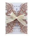 Rose gold glitter laser cut wedding invitation with ivory ribbon and sample text - Glitter Champagne Gold