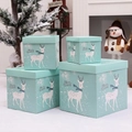 Set of four light blue Christmas gift boxes with white reindeer and polka dot patterns - Blue Deer Gift Box (Set of 4)
